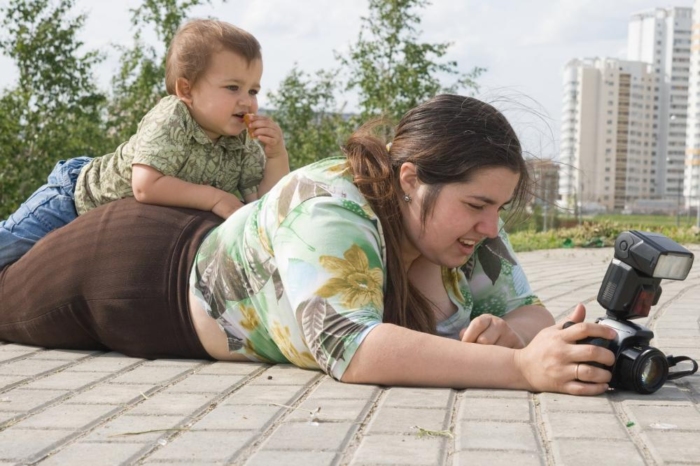 Overweight woman with her son.