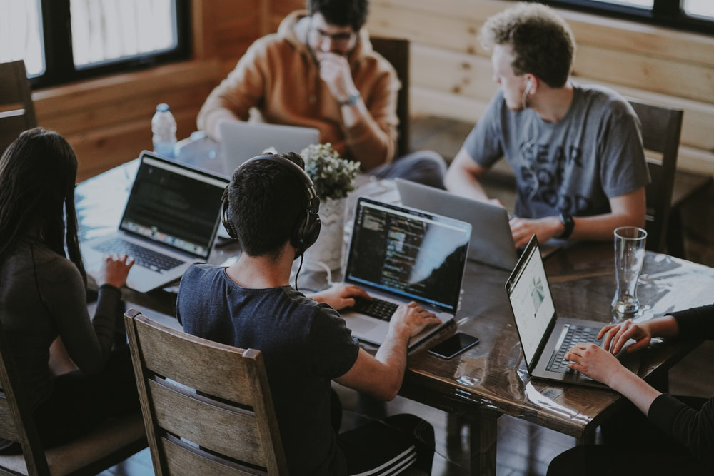 office employees sitting together in a meeting