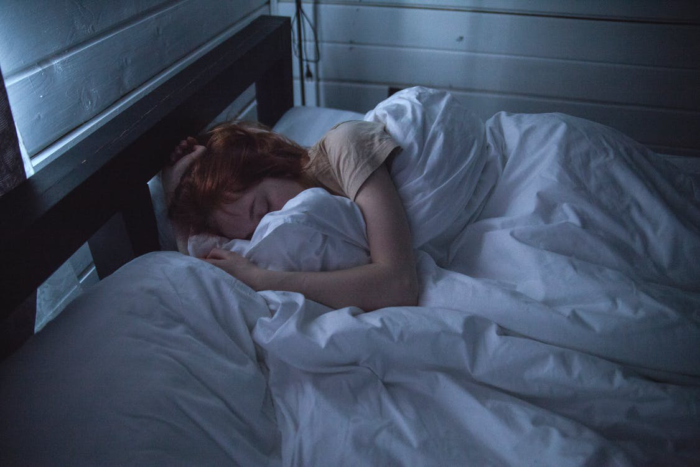 A lady sleeping through the night.
